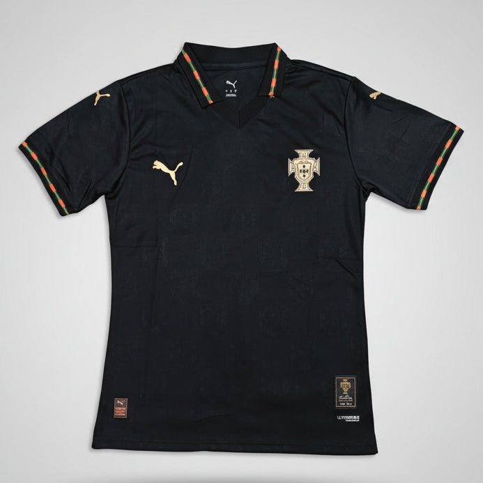Black sports jersey with Puma logo on a green background